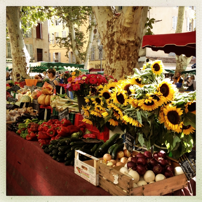 Gott in Frankreich: Sonnenblumen auf einem Markt