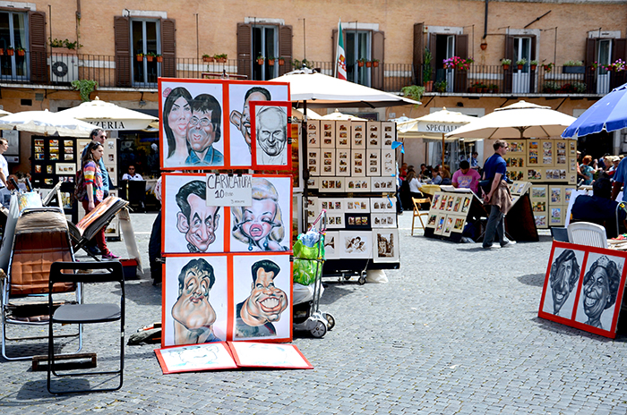 Portrait-Maler in Rom, die ihre Künste Touristen anpreisen