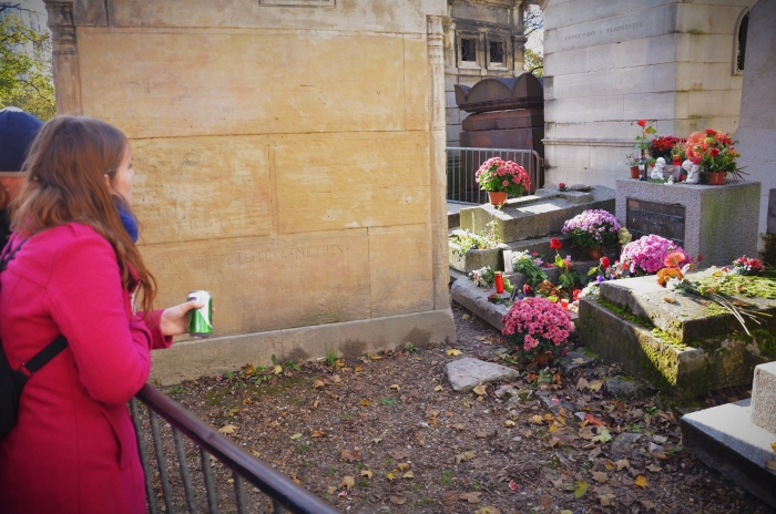 Young people at Jim Morrissons grave at Pere Lachaise