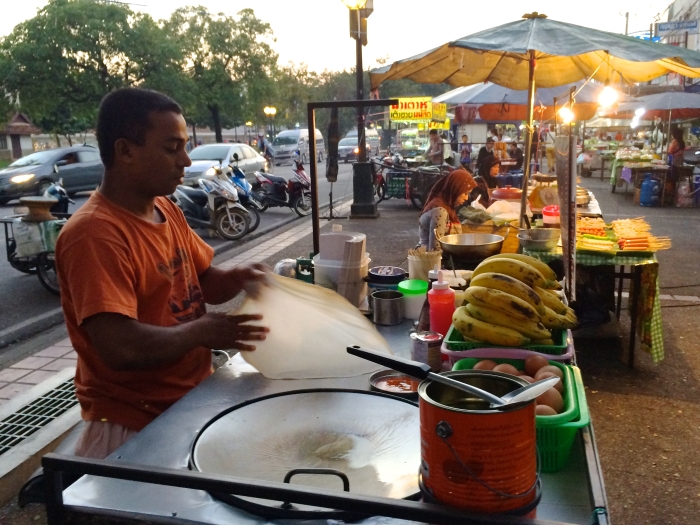 A man making roti in a Chiang Mai Restaurant 
