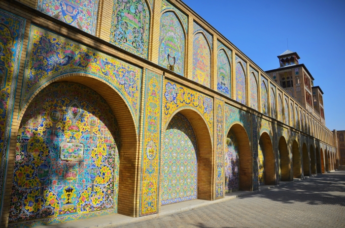 An long wall with colored tiles in the Golestan Palace in Tehran