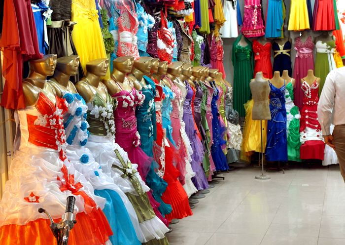 Woman in Iran: Brashly colorful woman clothes at the bazaar